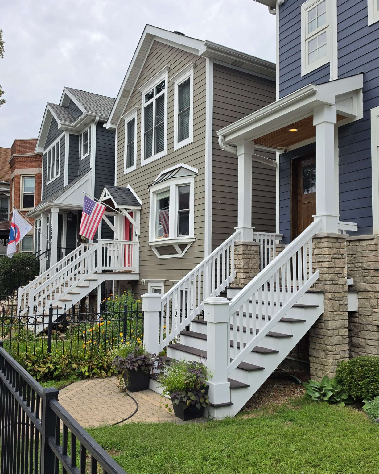 Homes with siding, front porches, and raised steps in Roscoe Village, Chicago